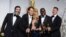 Anthony Katagas, from left, Jeremy Kleiner, Dede Gardner, Steve McQueen, and Brad Pitt pose in the press room with the award for best picture of the year for "12 Years a Slave" during the Oscars.
