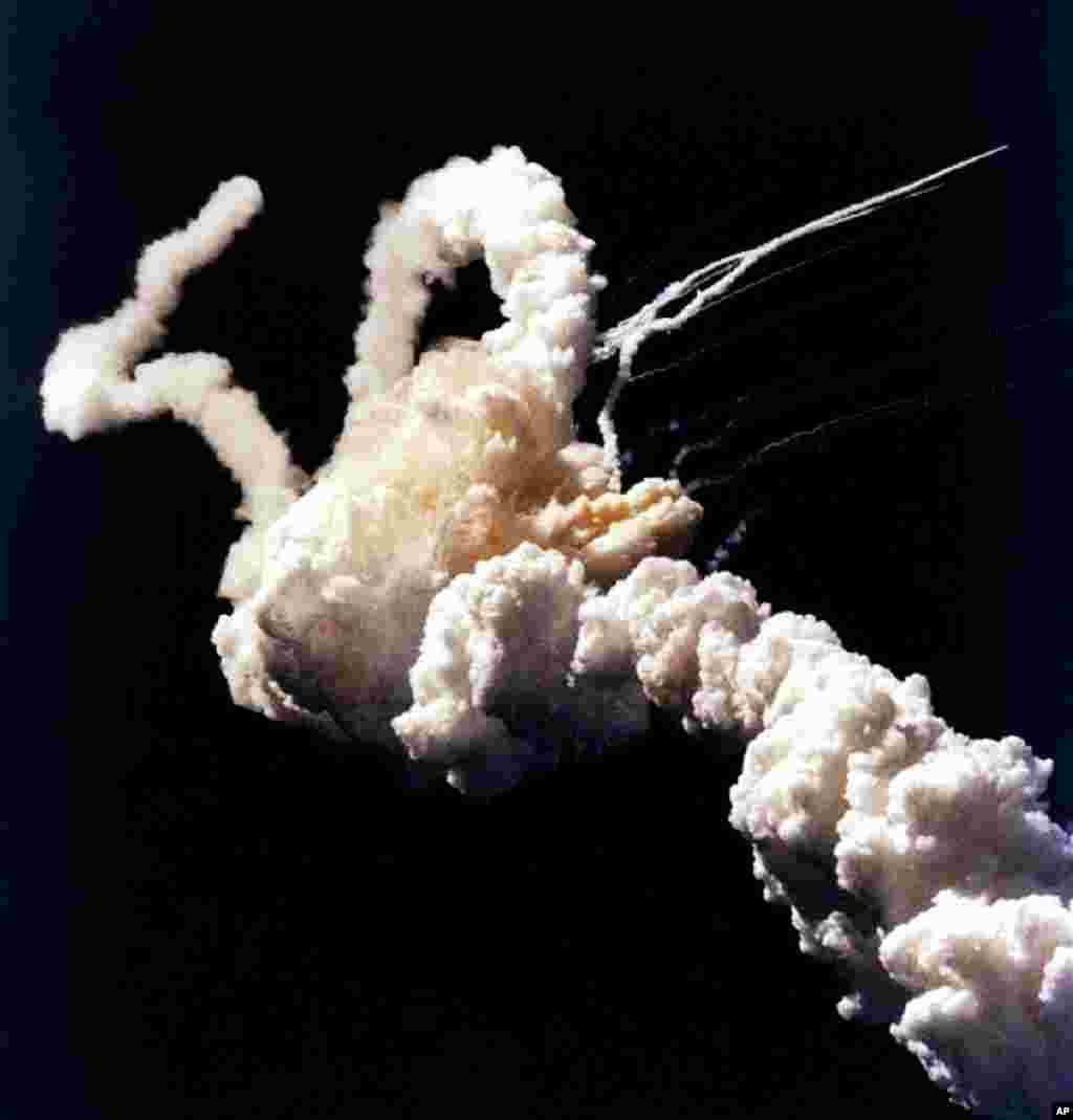 January 1986: The Space Shuttle Challenger explodes seconds after takeoff. Seven crew members perished in the explosion.
