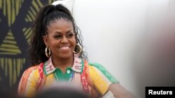 FILE - Former U.S. first lady Michelle Obama attends the Discussion on Ending Child Marriage and Empowering Adolescent Girls at the Centre for the Book in Cape Town, South Africa, Nov. 16, 2023.