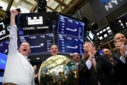 SolarWinds Corp. CEO Kevin Thompson celebrates his company's IPO on the floor of the New York Stock Exchange (NYSE) in New York, Oct. 19, 2018.