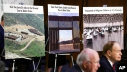 FILE - Posters are displayed as Committee Chairman Patrick Leahy, D-Vt., and Vice Chairman Richard Shelby, R-Ala., listen during a Senate Appropriations committee hearing on domestic extremism, May 12, 2021 on Capitol Hill in Washington.