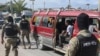 Police officers patrol near the Toussaint Louverture International Airport in Port-au-Prince, Haiti, Nov. 12, 2024.