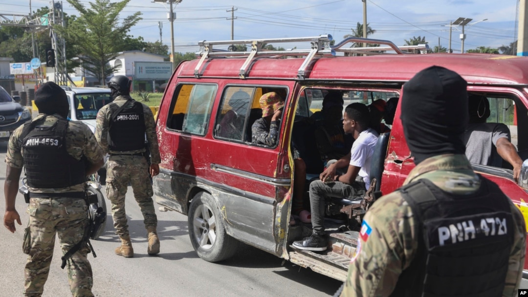 Police officers patrol near the Toussaint Louverture International Airport in Port-au-Prince, Haiti, Nov. 12, 2024.