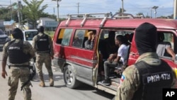 Police officers patrol near the Toussaint Louverture International Airport in Port-au-Prince, Haiti, Nov. 12, 2024.