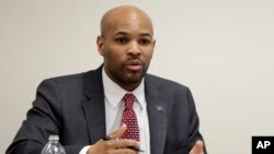 Indiana State Health Commissioner Dr. Jerome Adams comments on a Scott County HIV outbreak during a meeting in Scottsburg, Ind., March 25, 2015. Adams is President Donald Trump's pick to become U.S. surgeon general. 