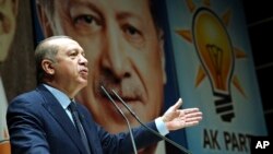 Turkey's President Recep Tayyip Erdogan addresses the members of his ruling party in Ankara, Turkey, Oct. 13, 2017. 