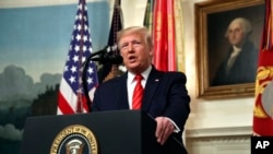 President Donald Trump speaks in the Diplomatic Room of the White House in Washington, Oct. 27, 2019.