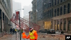 A crane collapsed on the street in the Tribeca neighborhood of New York’s Lower Manhattan, Feb. 5, 2016. 