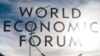 The sign of the World Economic Forum, WEF, is displayed at an entrance door at the congress center at the eve of the meeting in Davos, Sunday, Jan. 20, 2019. (AP Photo/Markus Schreiber)