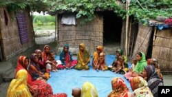 Women in a flood-prone community in Gaibandha, Bangladesh, gather once a week to share ideas about how to adapt to worsening climate and rising seas