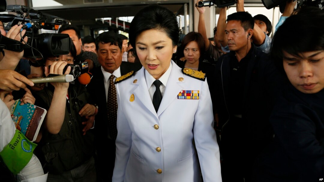 Thailand's Prime Minister Yingluck Shinawatra leaves a meeting with election commissioners at the Army Club, in Bangkok, Thailand, Jan. 28, 2014.
