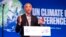 Former U.S. President Barack Obama gestures as he speaks during the COP26 U.N. Climate Summit in Glasgow, Scotland, Nov. 8, 2021.