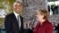 U.S. President Barack Obama, left, is welcomed by German Chancellor Angela Merkel prior to a meeting of the government heads of Germany, France, Italy, Spain and Britain in Berlin, Nov. 18, 2016.