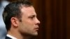 Olympic and Paralympic track star Oscar Pistorius listens to the verdict in his trial at the high court in Pretoria, September 12, 2014.