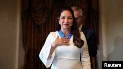 Cuban-American singer Gloria Estefan reacts upon being awarded Spain's Gold Medal of Merit for the Arts from Spain's Culture Minister Jose Guirao Cabrera in Madrid, Spain, July 23, 2018. 