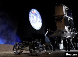 A model of the lunar rover in HAKUTO-R lunar exploration program by "ispace" is pictured at a venue to monitor its landing on the Moon, in Tokyo, Japan, April 26, 2023. (REUTERS/Kim Kyung-Hoon)
