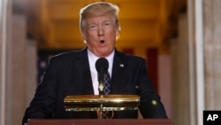 President Donald Trump speaks on Capitol Hill in Washington, April 25, 2017, during the United States Holocaust Memorial Museum's National Days of Remembrance ceremony. 