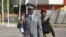 FILE - Burkina Faso's coup leader General Gilbert Diendere arrives at the airport to greet foreign heads of state in Ouagadougou, Burkina Faso, Sept. 23, 2015.