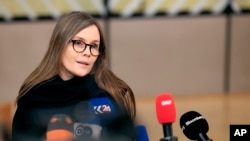 FILE - Icelandic Prime Minister Katrin Jakobsdottir speaks with the media as she arrives for an EU Summit in Brussels on March 22, 2024. Jakobsdottir announced her retirement as prime minister on April 5, 2024. She said she will run for president of the island nation.