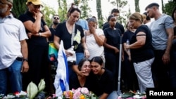 Mourners pay respects to Eden Yerushalmi, a hostage whose body was retrieved from Gazan captivity and brought to Israel along with those of five others, at her funeral in Petach Tikva, Israel, Sept. 1, 2024.