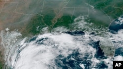 This satellite image provided by NOAA shows Tropical Storm Nicholas in the Gulf of Mexico, Sept. 12, 2021.