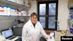 Hungarian biologist Noemi Lukacs poses for a picture at the laboratory in Szirak, Hungary, Nov. 13, 2020. 