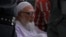 Bangladesh's Islamic party Jamaat-e-Islami former chief Ghulam Azam, center on wheelchair, is escorted by security people to a court in Dhaka, July 15, 2013. 