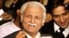 Presidential spokesman Farhatullah Babar speaks to the media after the supreme court of Pakistan announced its decision outside the court building in Islamabad December 16, 2009. Pakistan's highest court on Wednesday struck down an amnesty that has protec