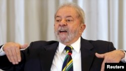 FILE - Former Brazilian President Luiz Inacio Lula da Silva talks to reporters in Sao Paulo, March 28, 2016. 