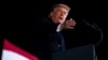 FILE - President Donald Trump speaks during a campaign rally for Georgia Sens. Kelly Loeffler and David Perdue, at Dalton Regional Airport, Jan. 4, 2021, in Dalton, Ga.