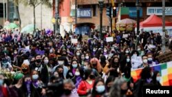 People participate in a rally during International Women's Day celebrations in Bogota, Colombia March 8, 2021. REUTERS/Luisa Gonzalez