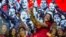 FILE - Spain's Jenni Hermoso holds the trophy as the team celebrates its Women's World Cup victory in Madrid on Aug. 21, 2023. The Spanish prosecutor's office announced on Sept. 6, 2023, that Hermoso has formally accused Luis Rubiales of sexual assault.