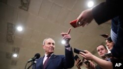 FILE - Senate Democratic Minority Leader Chuck Schumer speaks to the media after leaving the Senate chamber on Capitol Hill in Washington, Feb. 3, 2020.