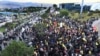 Hezbollah supporters protest near Beirut's international airport against Lebanon's decision to revoke permission for an Iranian carrier after Israel accused Iran of smuggling cash to Hezbollah, in Beirut, Feb. 15, 2025. 