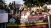 FILE - Journalists take part in a demonstration on the occasion of World Press Freedom Day in Lahore, Pakistan, May 3, 2024.