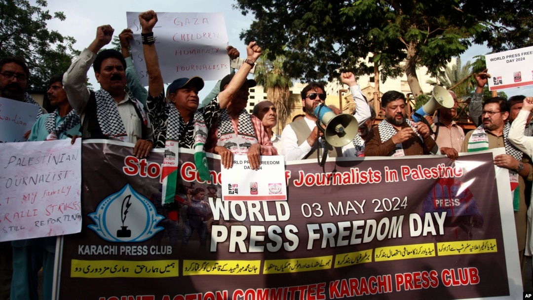 FILE - Journalists take part in a demonstration on the occasion of World Press Freedom Day in Lahore, Pakistan, May 3, 2024.