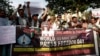 FILE - Journalists take part in a demonstration on the occasion of World Press Freedom Day, also condemning the killing of a journalist in a bomb explosion, in Lahore, Pakistan, May 3, 2024.