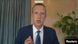 FILE PHOTO: Facebook CEO Mark Zuckerberg testifies remotely via videoconference in this screengrab made from video during a Senate Judiciary Committee hearing in Washington, Nov. 17, 2020. 