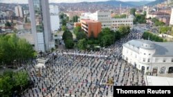 Activists and supporters of Kosovo interim Prime Minister Albin Kurti's party Vetevendosje, attend a protest against new government in Kosovo without holding new elections, in Pristina on May 28, 2020.