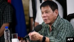 Philippines' president-elect Rodrigo Duterte speaks during a press conference in Davao on May 31, 2016.