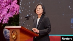 Taiwan President Tsai Ing-wen delivers a speech on the day of her seventh year anniversary since she held office in Taipei,