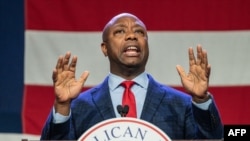 FILE - U.S. Senator Tim Scott speaks at the Republican Party of Iowa's 2023 Lincoln Dinner at the Iowa Events Center in Des Moines, Iowa, July 28, 2023.