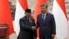 Chinese President Xi Jinping and Indonesian President Prabowo Subianto shake hands during a signing ceremony at the Great Hall of the People in Beijing, Nov. 9, 2024.