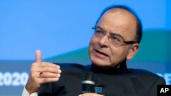 FILE - Then-India's Finance Minister Arun Jaitley speaks during a panel discussion at the World Bank-IMF Annual Meetings at IMF headquarters in Washington, Oct. 7, 2016. 