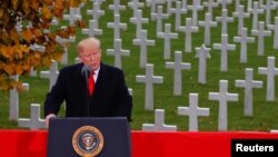 U.S. President Donald Trump speaks as he takes part in the commemoration ceremony for Armistice Day, 100 years after the end of World War One, at the Suresnes American Cemetery and Memorial in Paris, Nov. 11, 2018. 