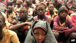 A group of schoolboys are pictured on Friday Dec. 18, 2020 in Katsina, Nigeria following their release after they were kidnapped earlier this week. More than 300 schoolboys kidnapped last week in an attack on their school in northwest Nigeria have…
