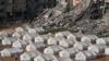 A tent camp for displaced Palestinians is set up next to destroyed buildings following the Israeli air and ground offensive in Jabaliya, Gaza Strip, Feb. 6, 2025.