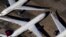 FILE - Delta Air Lines passenger planes are seen at Birmingham-Shuttlesworth International Airport in Birmingham, Alabama, March 25, 2020.