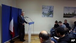 Paris prosecutor Francois Molins gives a press conference, in Paris, Friday, Nov. 25, 2016.