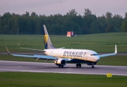 FILE - In this May 23, 2021, photo, a Ryanair jet that carried opposition figure Raman Pratasevich was diverted to Minsk, Belarus, after a bomb threat.